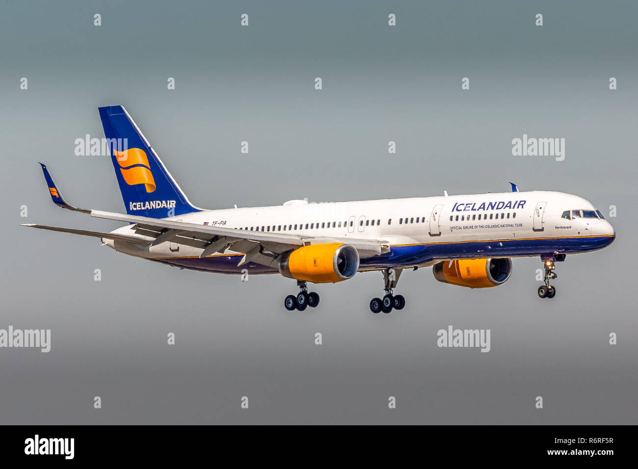 An Icelandair Boeing 757, registration TF-FIA, landing at Manchester Airport in England. Stock Photo