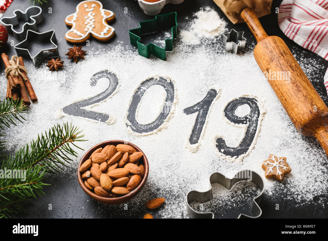 2019 New Year greeting written on flour. Winter holidays still life composition Stock Photo