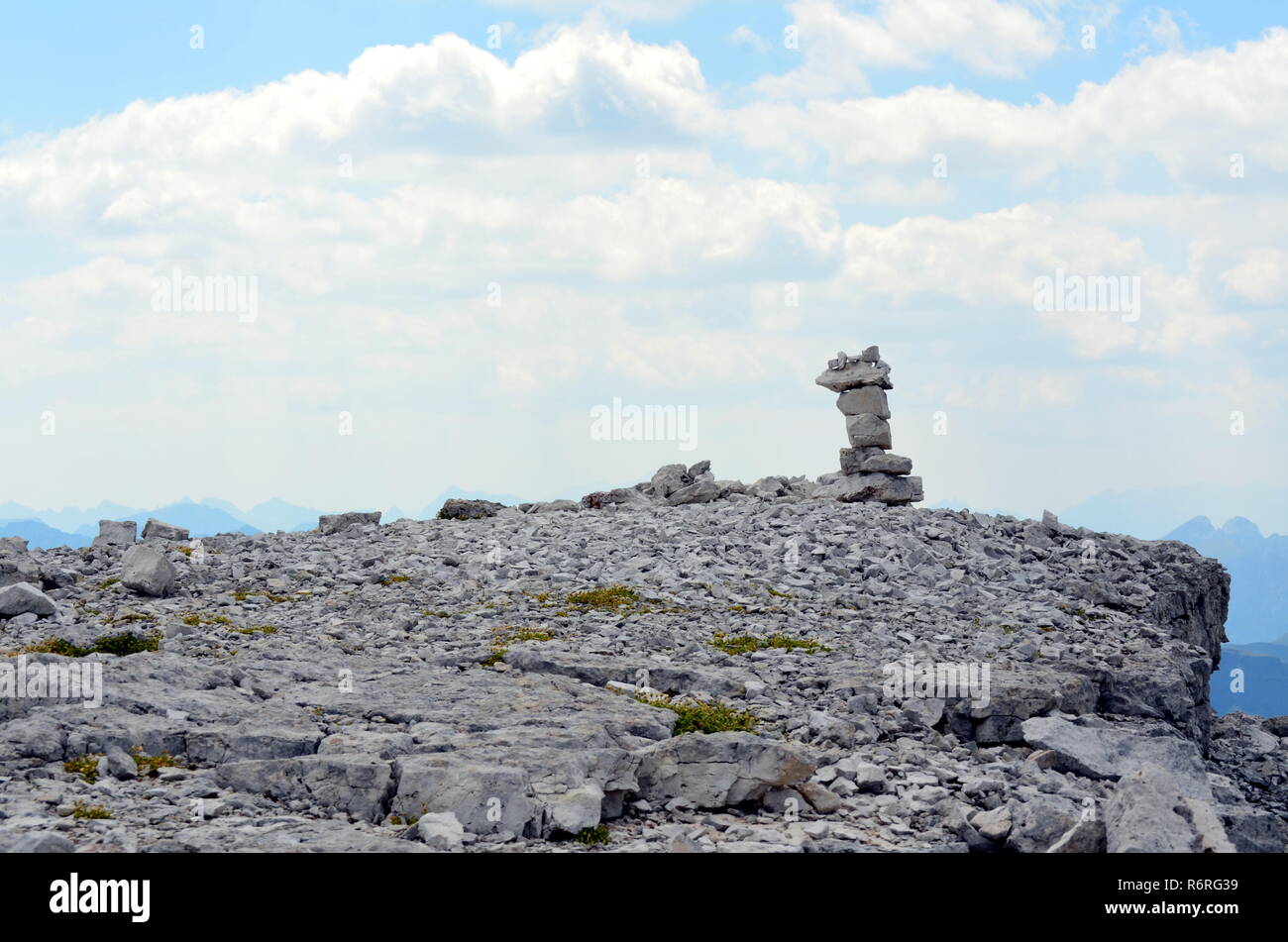 Pyramid of stones on the mountainside Stability and Equilibrium Stock Photo