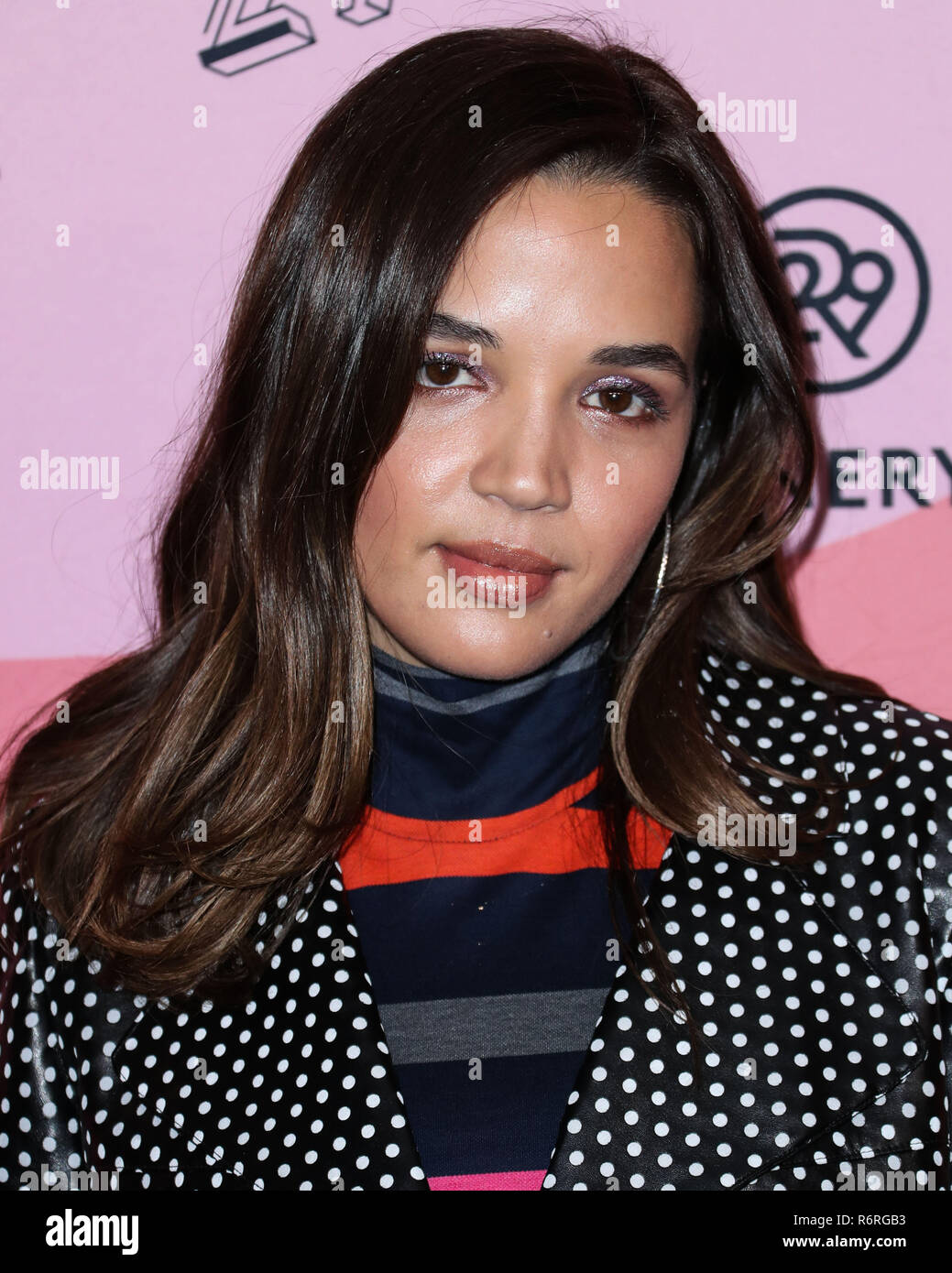 LOS ANGELES, CA, USA - DECEMBER 04: Actress Georgie Flores arrives at