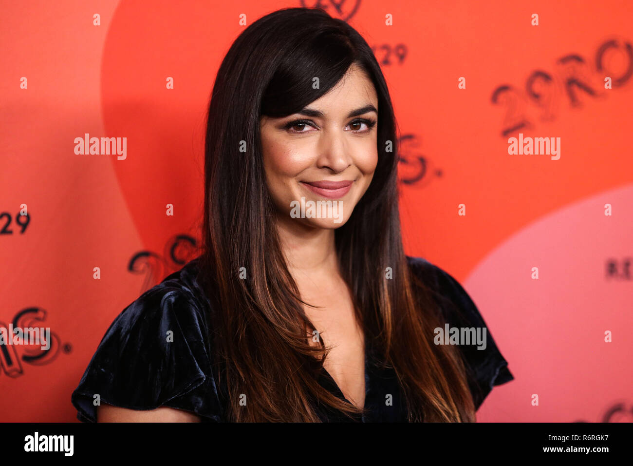 LOS ANGELES, CA, USA - DECEMBER 04: Actress Hannah Simone arrives at