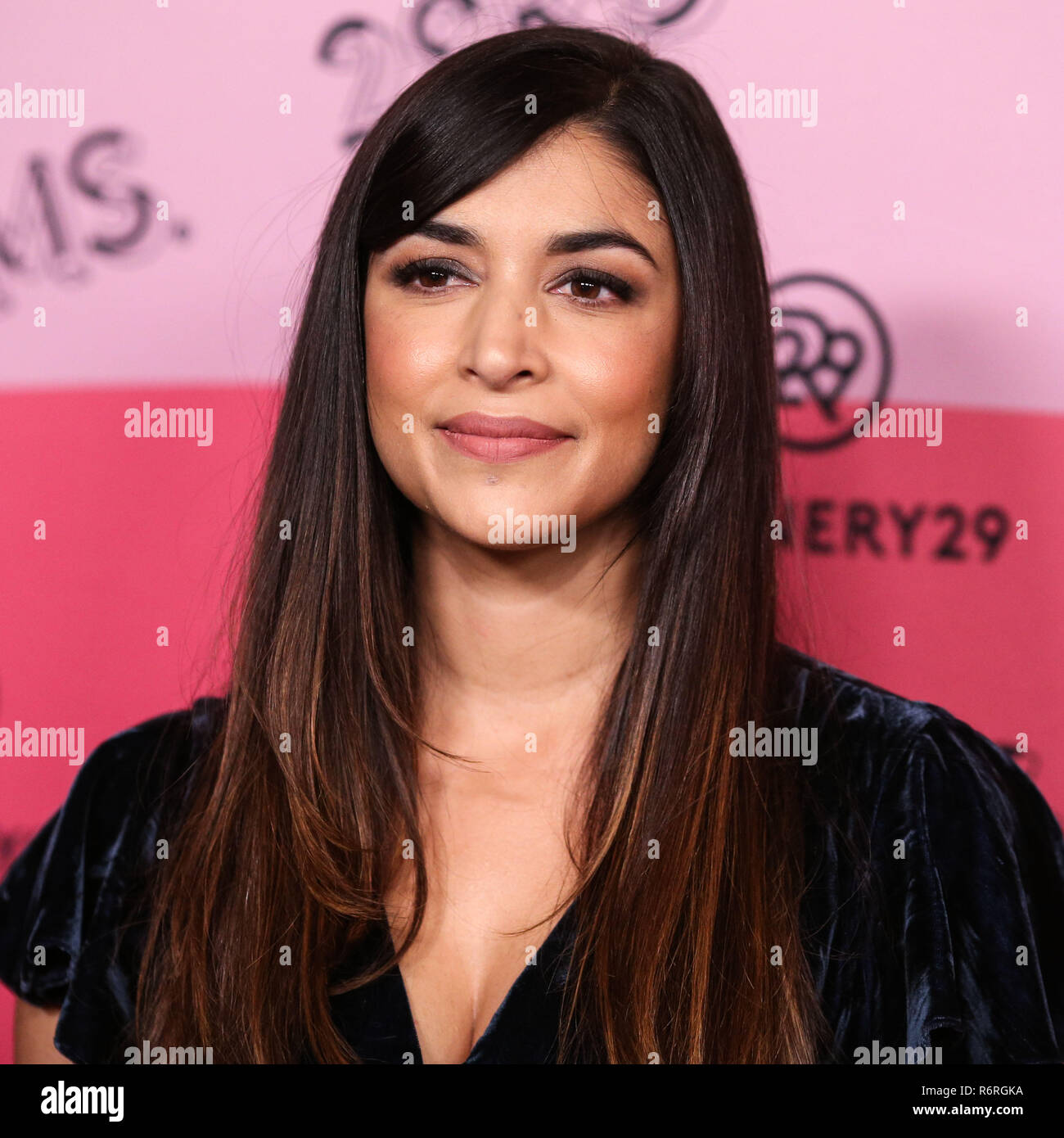 LOS ANGELES, CA, USA - DECEMBER 04: Actress Hannah Simone arrives at