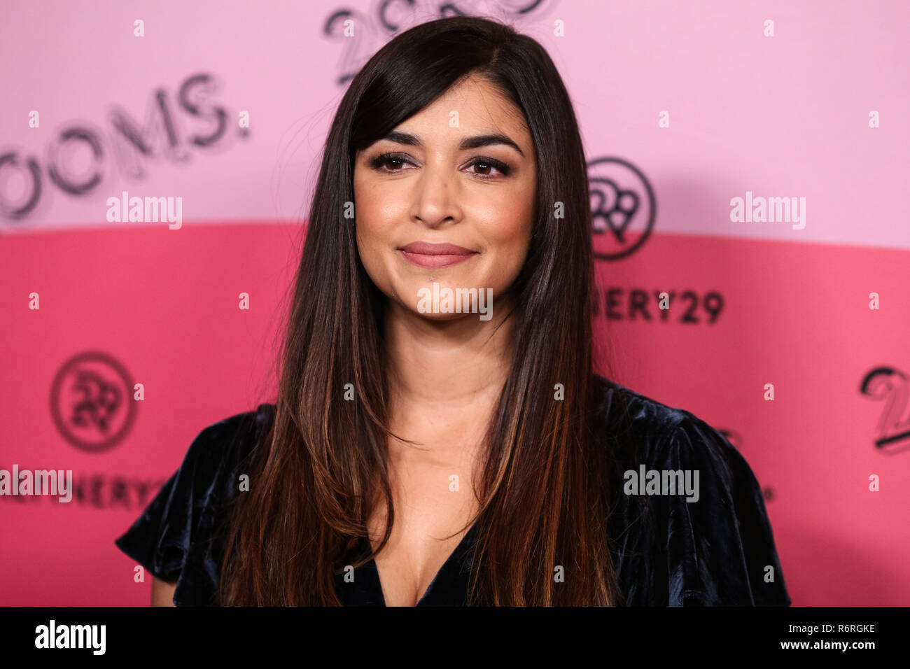 LOS ANGELES, CA, USA - DECEMBER 04: Actress Hannah Simone arrives at