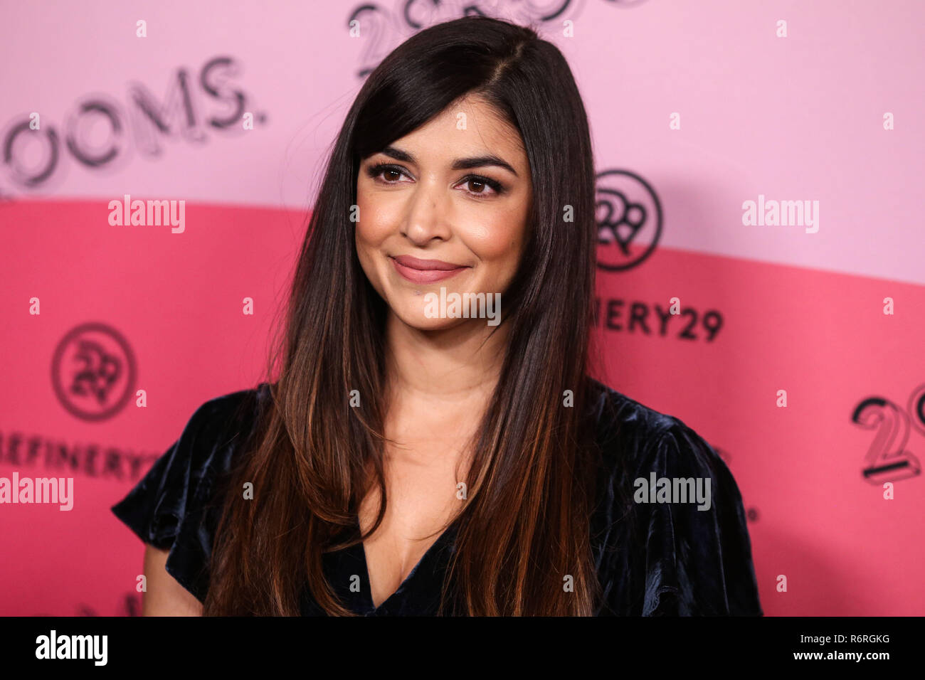 LOS ANGELES, CA, USA - DECEMBER 04: Actress Hannah Simone arrives at