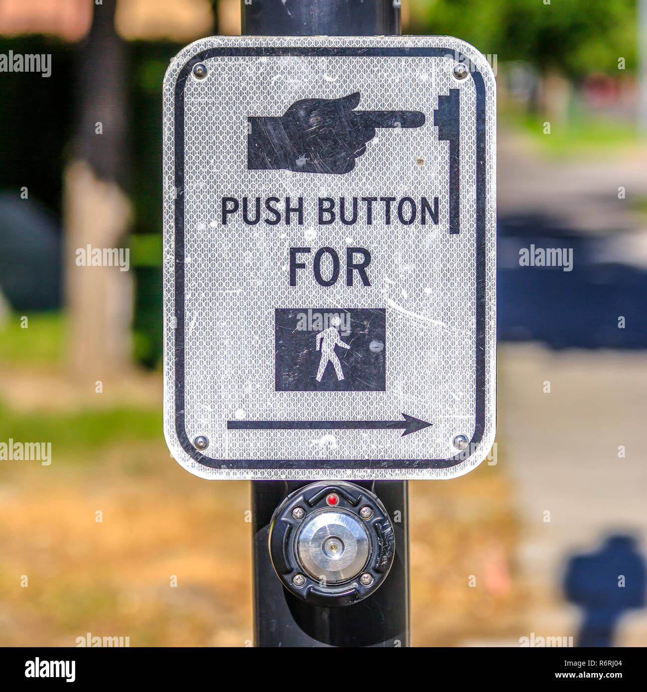 Push button for pedestrian crossing sign on a road Stock Photo Alamy