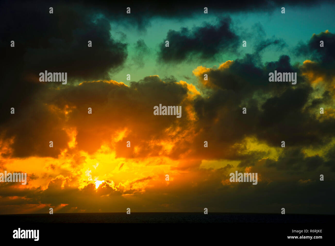 Dramatic sunrise over the ocean before storm Stock Photo - Alamy