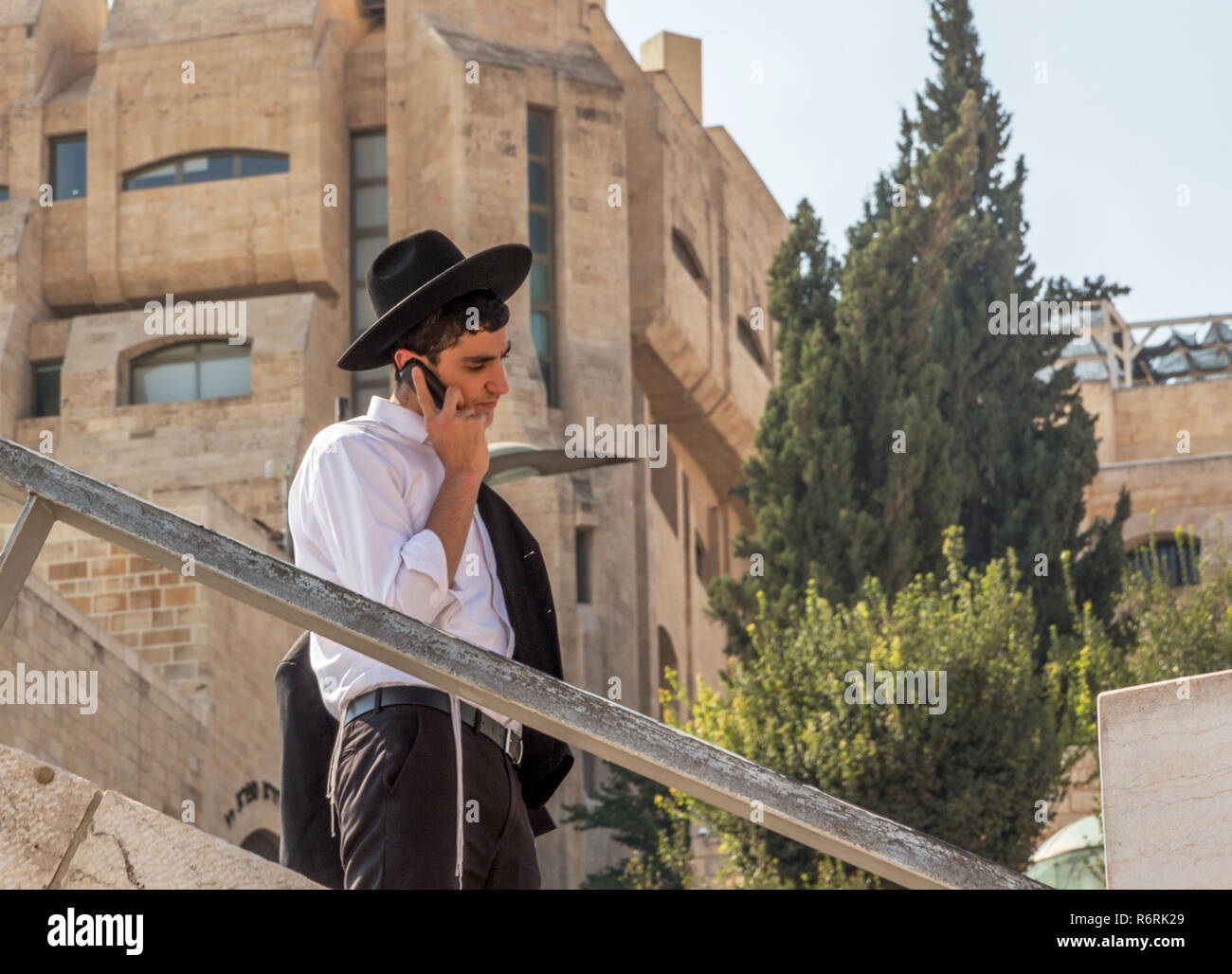 Orthodox Jewish man near the Western wall or Wailing wall, old city of Jerusalem, Israel, Middle East Stock Photo