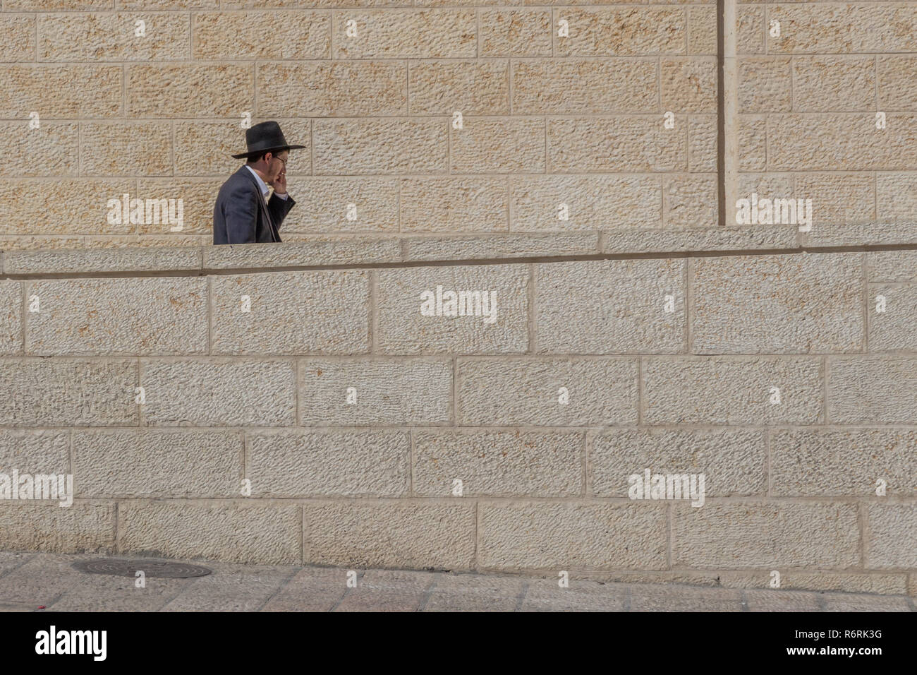 Orthodox Jewish man near the Western wall or Wailing wall, old city of Jerusalem, Israel, Middle East Stock Photo