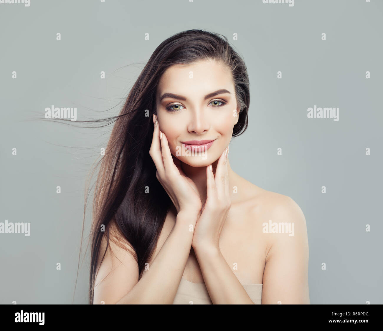 Brunette Woman With Straight Hair And Healthy Skin Haircare