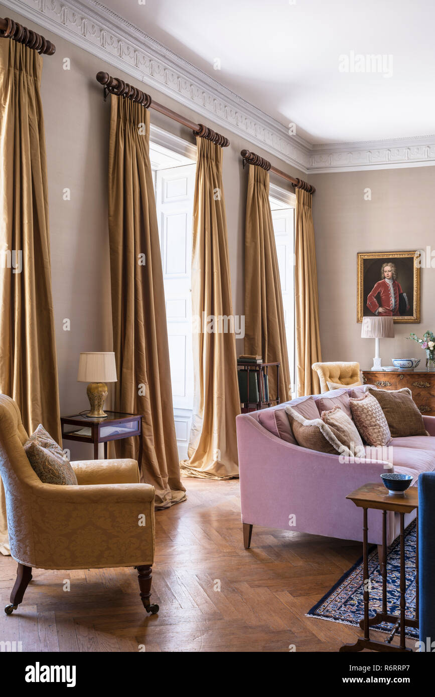 Gold and pink furnished drawing room in 18th century Goodnestone mansion Stock Photo