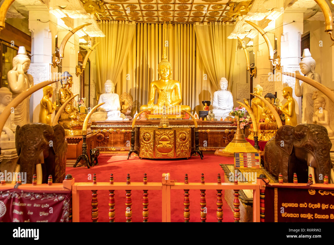 Golden Buddha in the Temple of the Tooth, Kandy, Sri Lanka Stock Photo