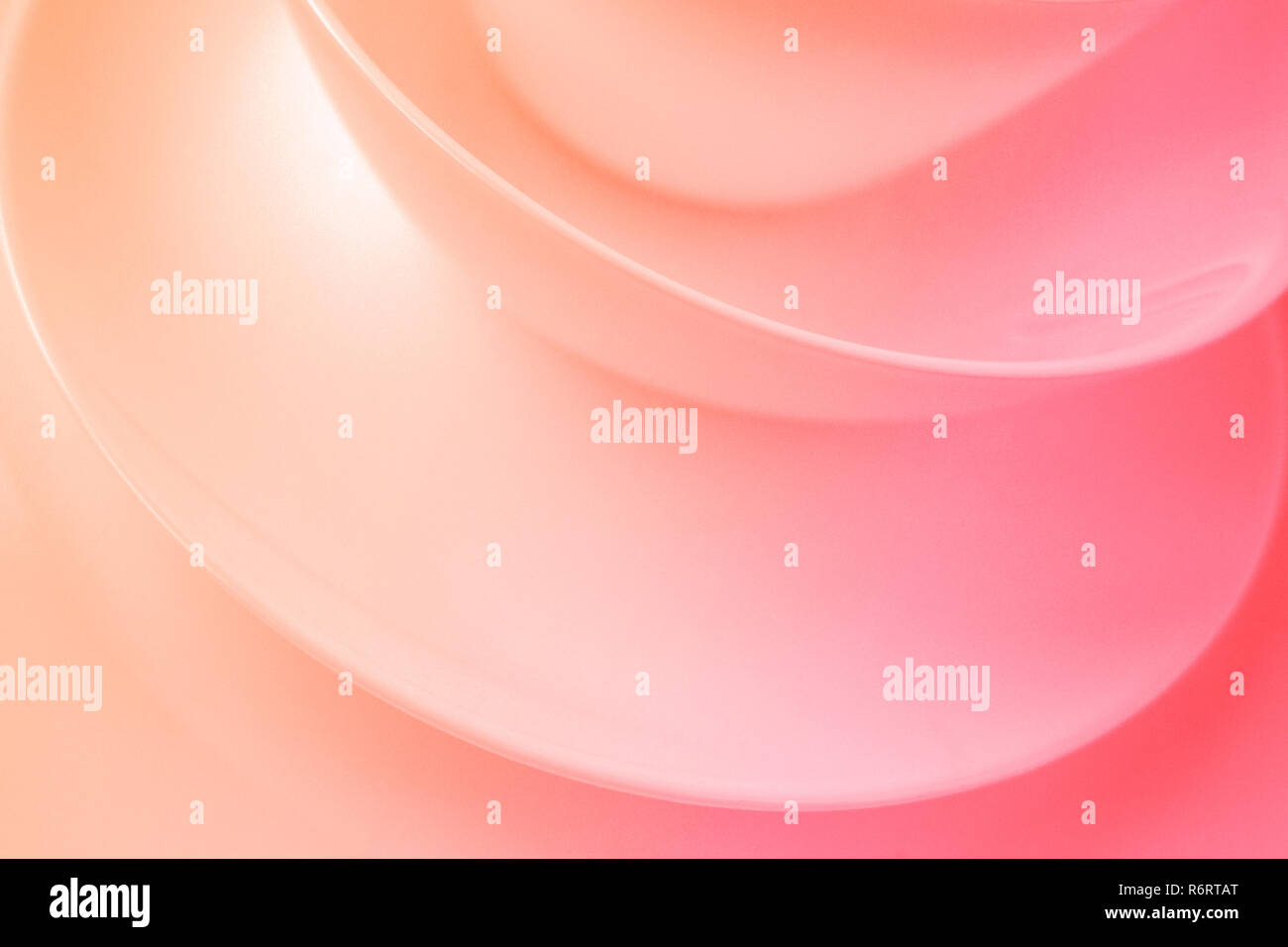 Abstract background with smooth lines in coral color. Living coral color of the Year 2019. Stock Photo