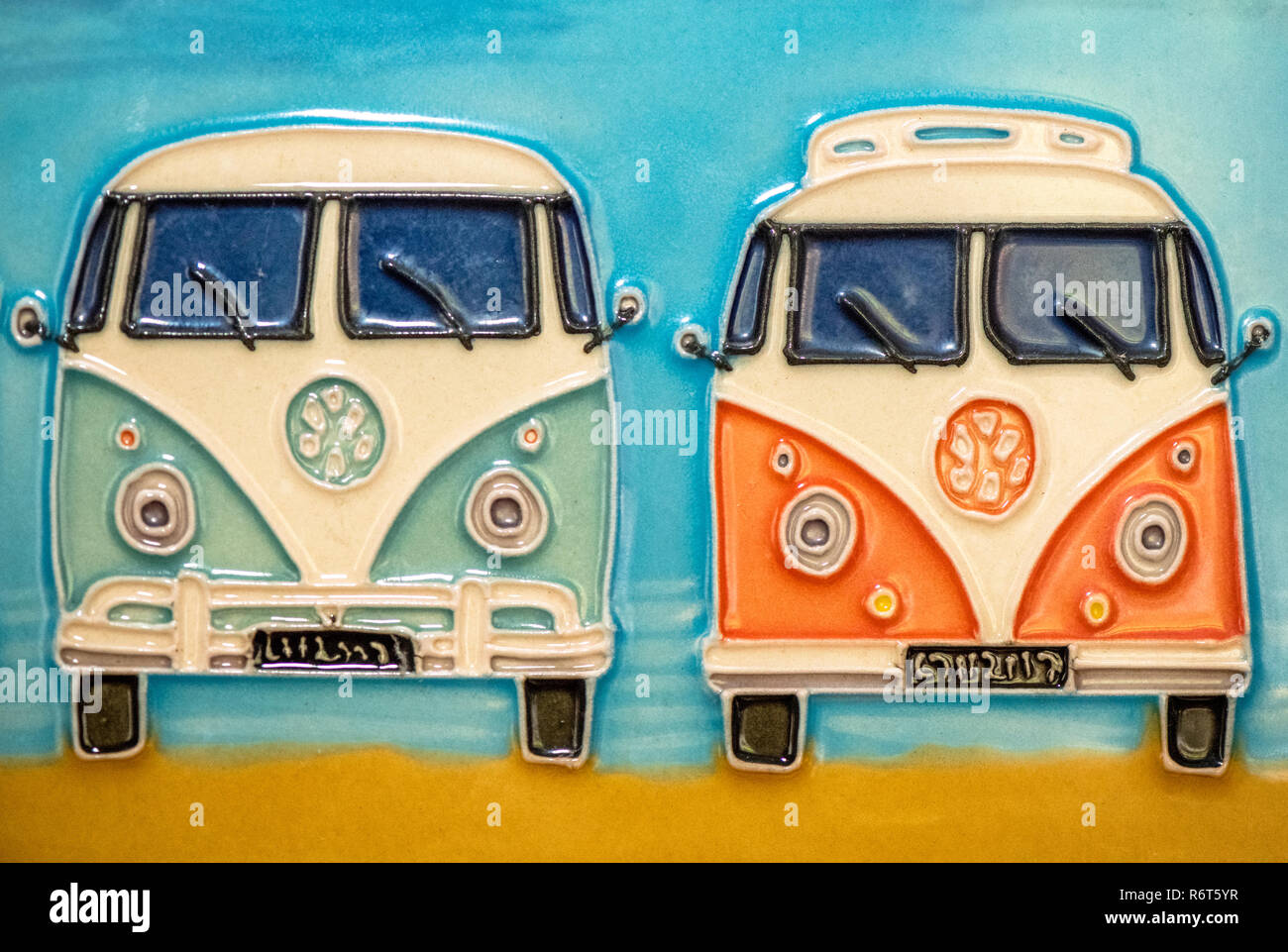 Ceramic wall picture of V.W. campervans. Stock Photo