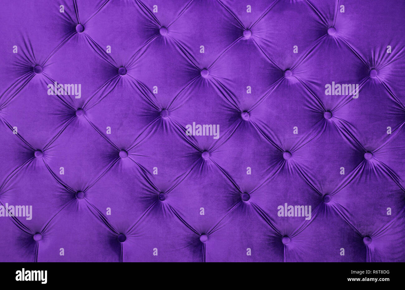 Violet capitone tufted fabric upholstery texture Stock Photo