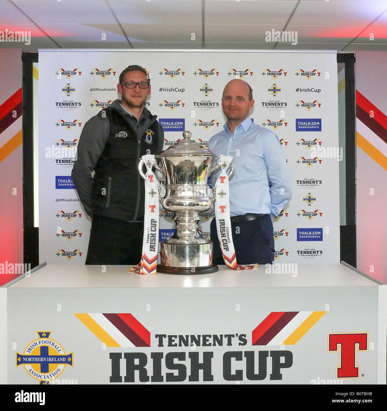 Windsor Park, Belfast, Northern Ireland, UK. 06 December 2018. The draw for the Fifth Round of the Tennent's Irish Cup was made today. At this stage Irish Premiership and Championship clubs come into the draw along with intermediate/junior sides. The fifth round ties will be played on 05 January 2019. Cliftonville v Dungannon Swifts. (L-R) Dungannon Swifts manager Kris Lindsay and Cliftonville manager Barry Gray. Credit: David Hunter/Alamy Live News. Stock Photo