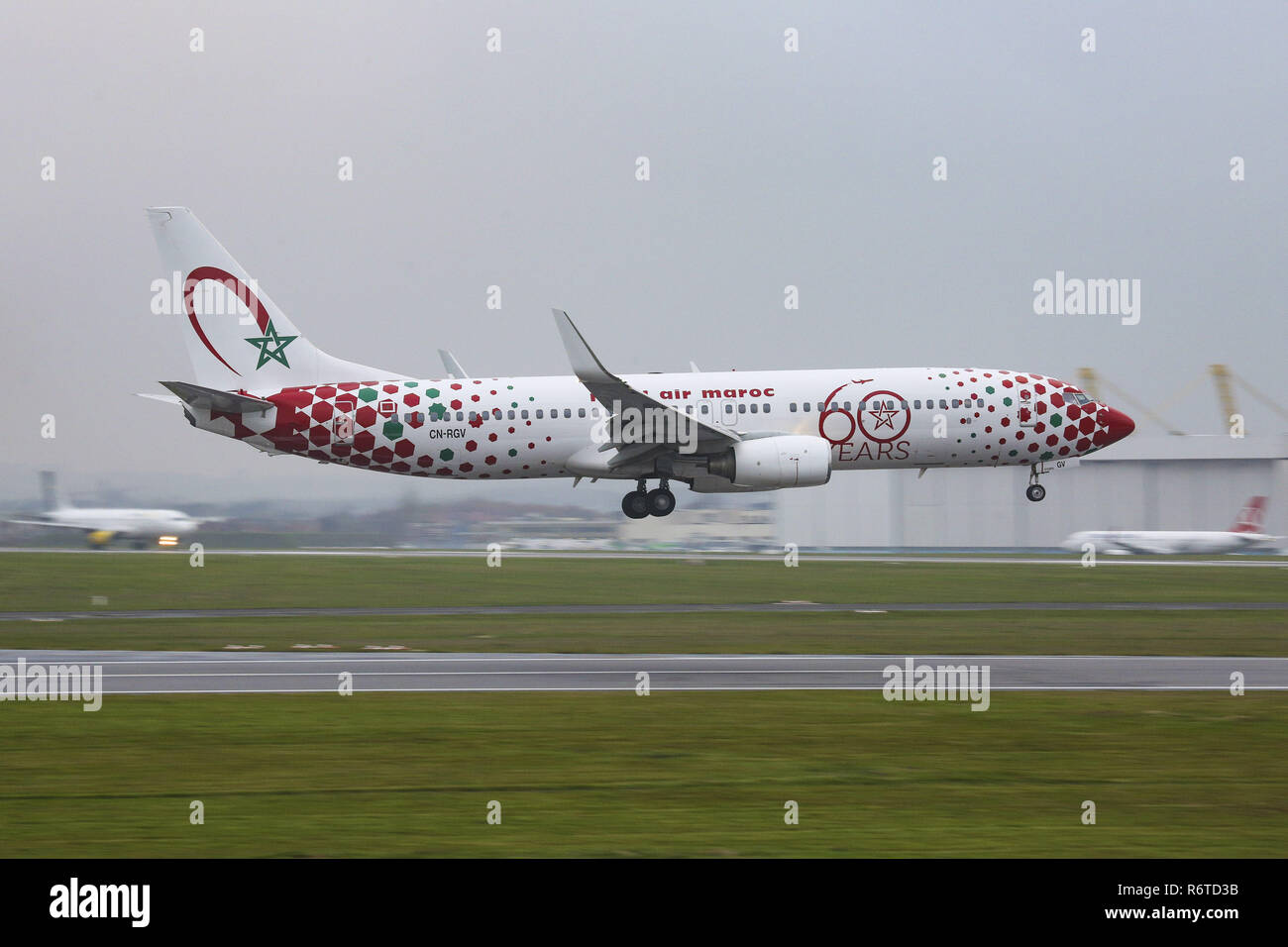 December 1, 2017 - Brussels, Belgium - The Royal Air Maroc or RAM Boeing 737-800 is seen landing at the Brussels International Airport in Belgium, known as Brussels National or Zavantem Airport with IATA / ICAO codes BRU and EBBR.. The aircraft is a Boeing 737-800 with registration CN-RGV and is painted in special scheme ''60 years'' livery. RAM connects Brussels to Casablanca, Nador, Rabat, Tangier and seasonal to Al Hoceima and Oujda. (Credit Image: © Nicolas Economou/SOPA Images via ZUMA Wire) Stock Photo