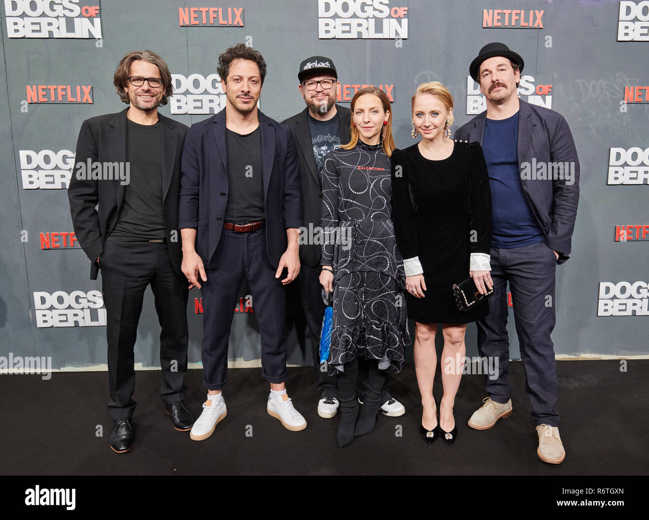 Berlin, Germany. 06th Dec, 2018. Siegfried Kamml (l-r), Showrunner, Fahri Yardim, actor, Christian Alvart, Showrunner, Katharina Schüttler, actress, Anna Maria Mühe, actress, and Felix Kramer, actor, come to the film premiere of the Netflix series 'Dogs of Berlin' at the Kino International. The four actors are leading actors under the direction of Kamml and Alvart. Credit: Annette Riedl/dpa/Alamy Live News Stock Photo