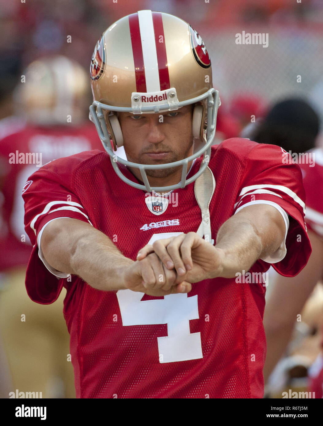 August 27, 2011 - San Francisco, California, U.S - Stretching on the sidelines San Francisco 49ers punter Andy Lee (4) on Sunday, August 27, 2011 at Candlestick Park, San Francisco, California.  The Texans defeated the 49ers in preseason game 30-7. (Credit Image: © Al Golub/ZUMA Wire) Stock Photo