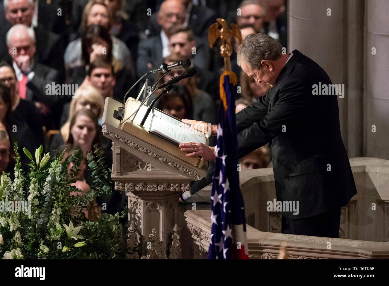 Former President George W. Bush pauses to gain his composure as he delivers the eulogy for his father, former President George H.W. Bush, at his State Funeral at the National Cathedral December 5, 2018 in Washington, DC. Bush, the 41st President, died in his Houston home at age 94. Stock Photo