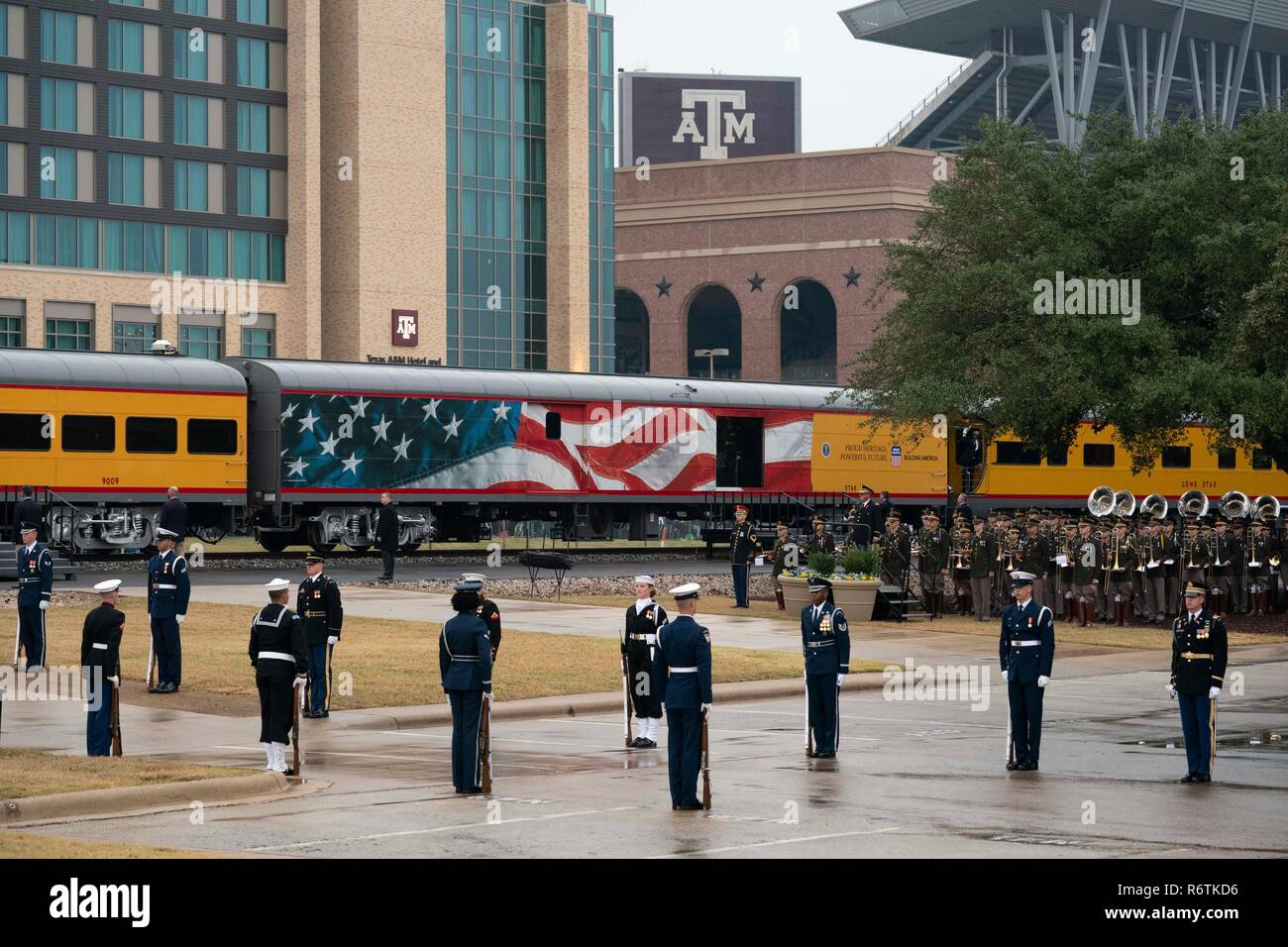 Train carrying the casket of former President George H.W. Bush from Houston arrives at Texas A&M University in College Station for burial at the nearby George Bush Library. Stock Photo