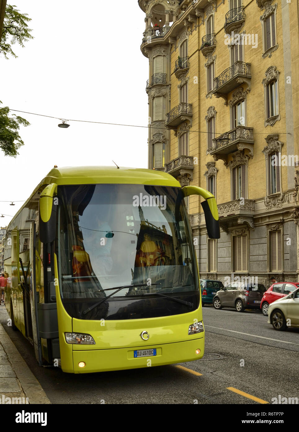 Turin, Piedmont, Italy. July 2018. Departure for the boys' summer camp: the big yellow bus is loaded with the backpacks of the boys. As everything is  Stock Photo