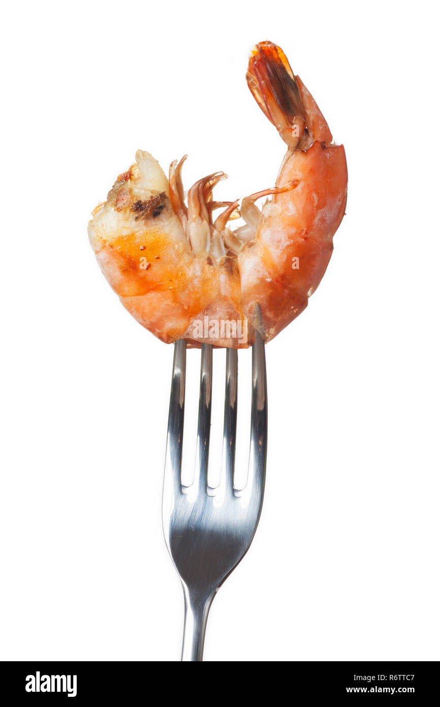 grilled shrimps on a fork on white Stock Photo