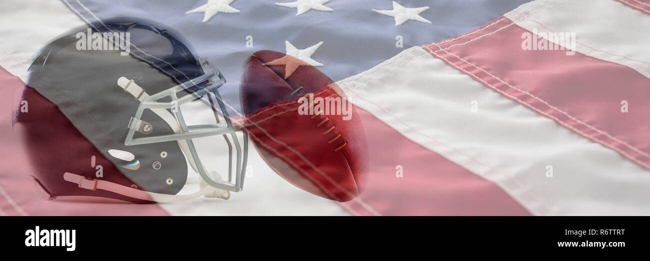 Close-up of American football and helmet against close-up of cropped american flag Stock Photo