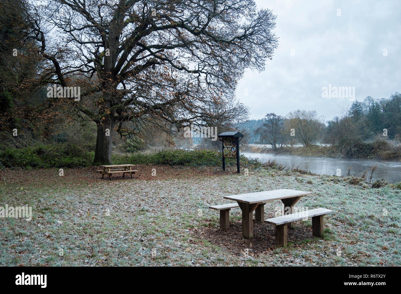 Relaxation or picnic area on a frosty morning beside the River Suir in Cahir, Tipperary, Ireland Stock Photo