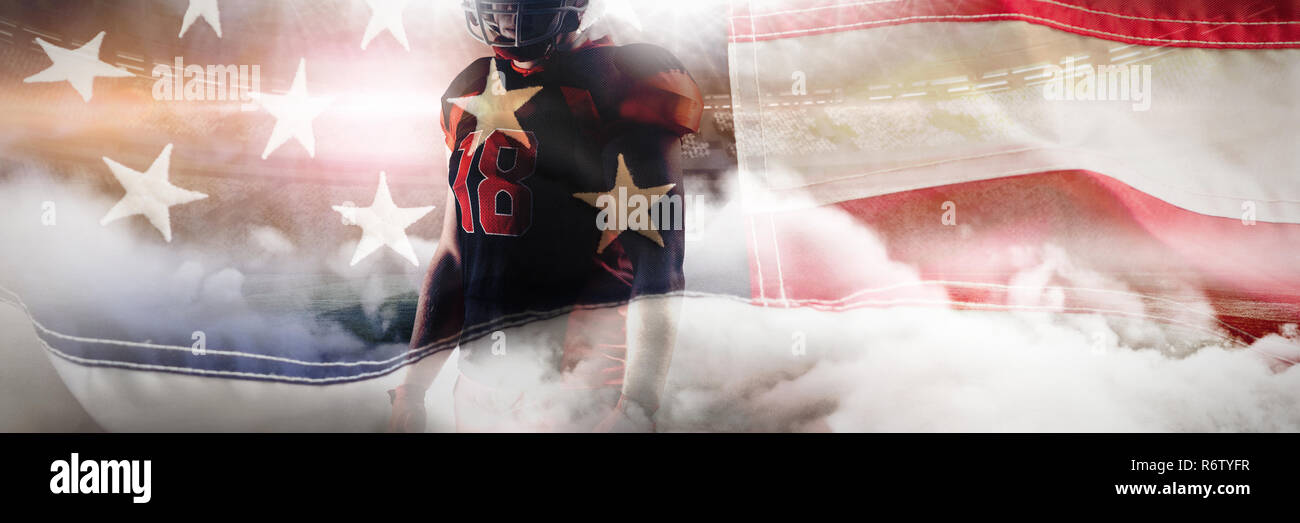 American football player standing with rugby helmet against full frame of american flag Stock Photo