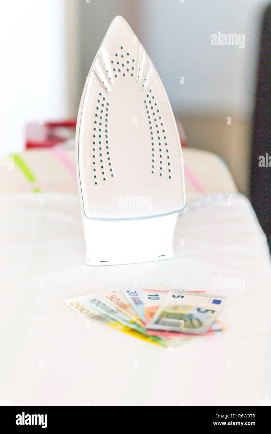 Ironing money hires stock photography and images Alamy