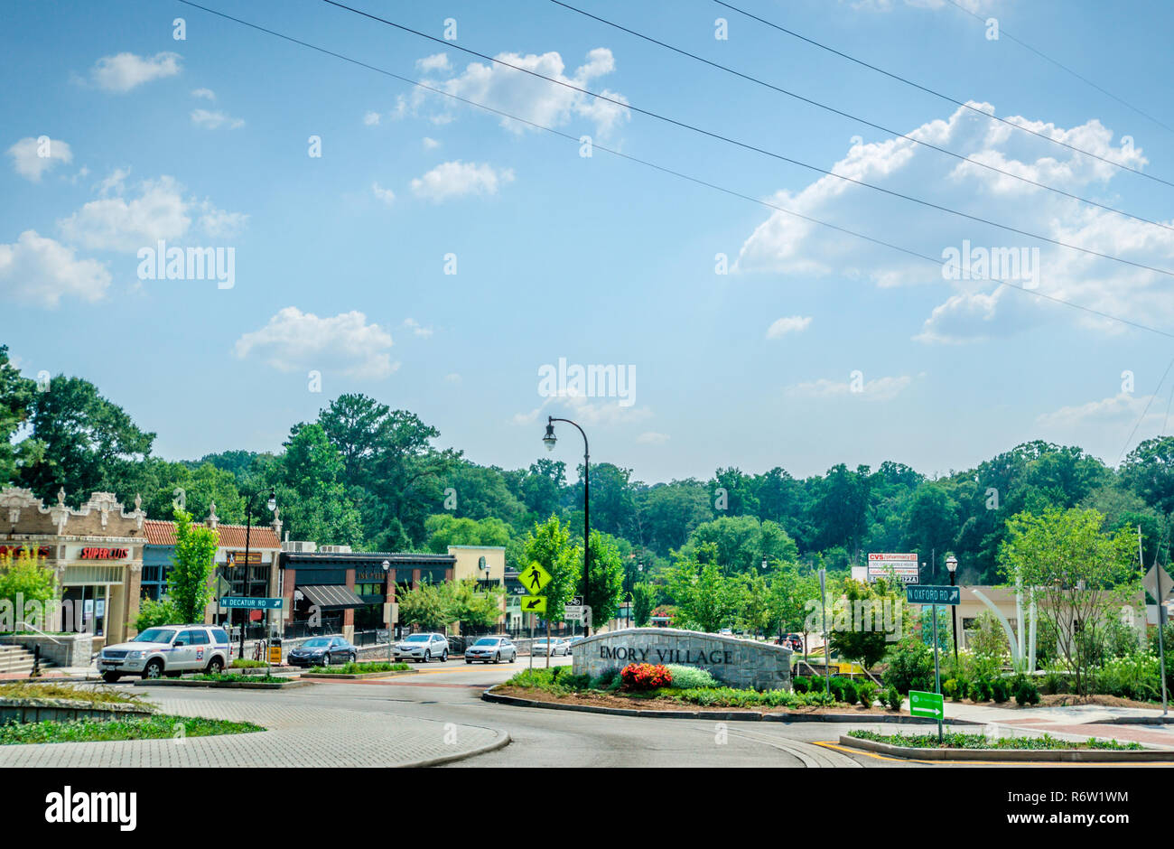 A sign welcomes visitors to Emory Village, a commercial district serving nearby Druid Hills and Emory University,  July 7, 2014, in Atlanta, Georgia. Stock Photo