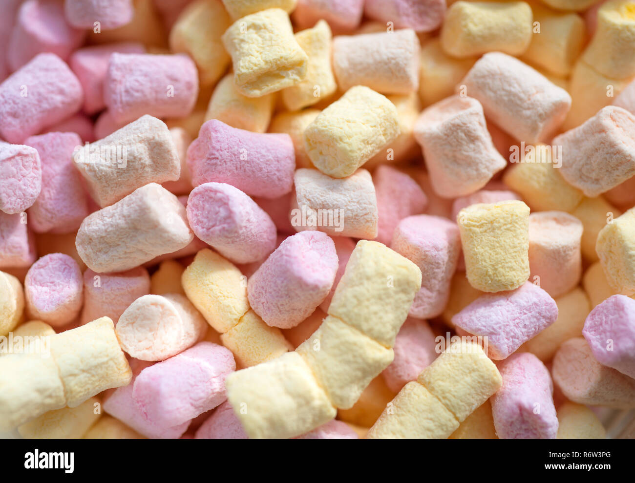 Spongy and sugary. Colorful mini marshmallow background or texture