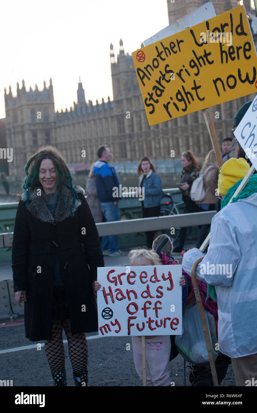 Extinction Rebellion demonstration drawing politicians and the public's attention to the serious issues of Climate Cnange .5 main bridges across River Stock Photo