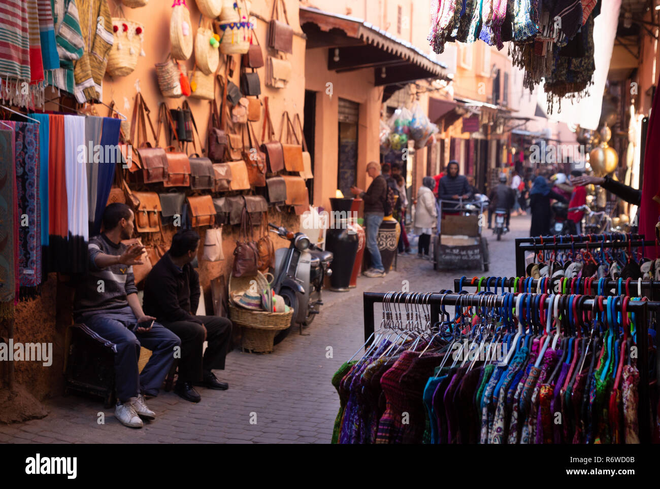 Marrakech souk - people shopping in the souks; the Marrakesh Medina, Marrakech, Morocco, North Africa Stock Photo