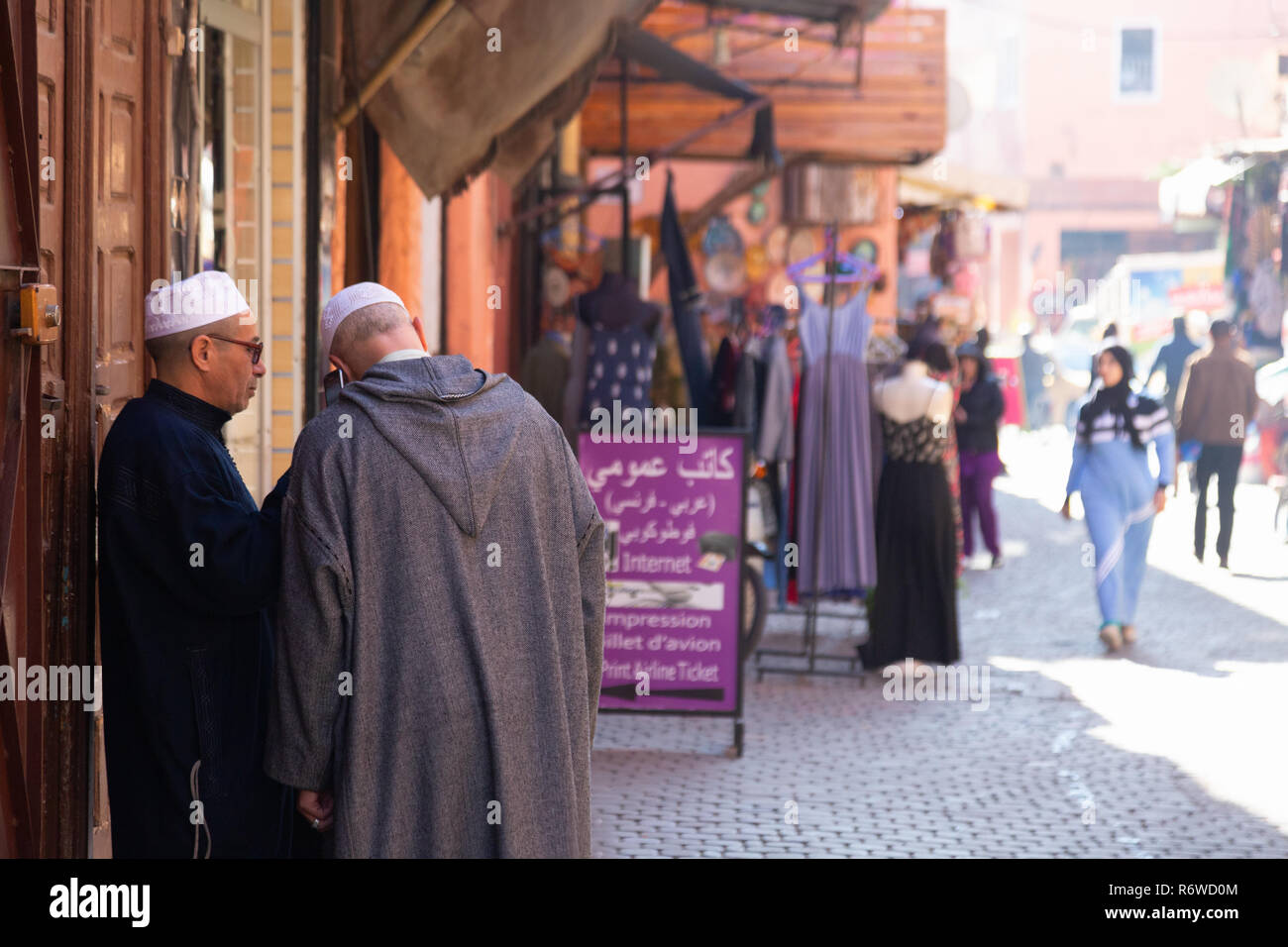 Marrakech street scene with local moroccan people, the Medina, Marrakech, Morocco North Africa Stock Photo