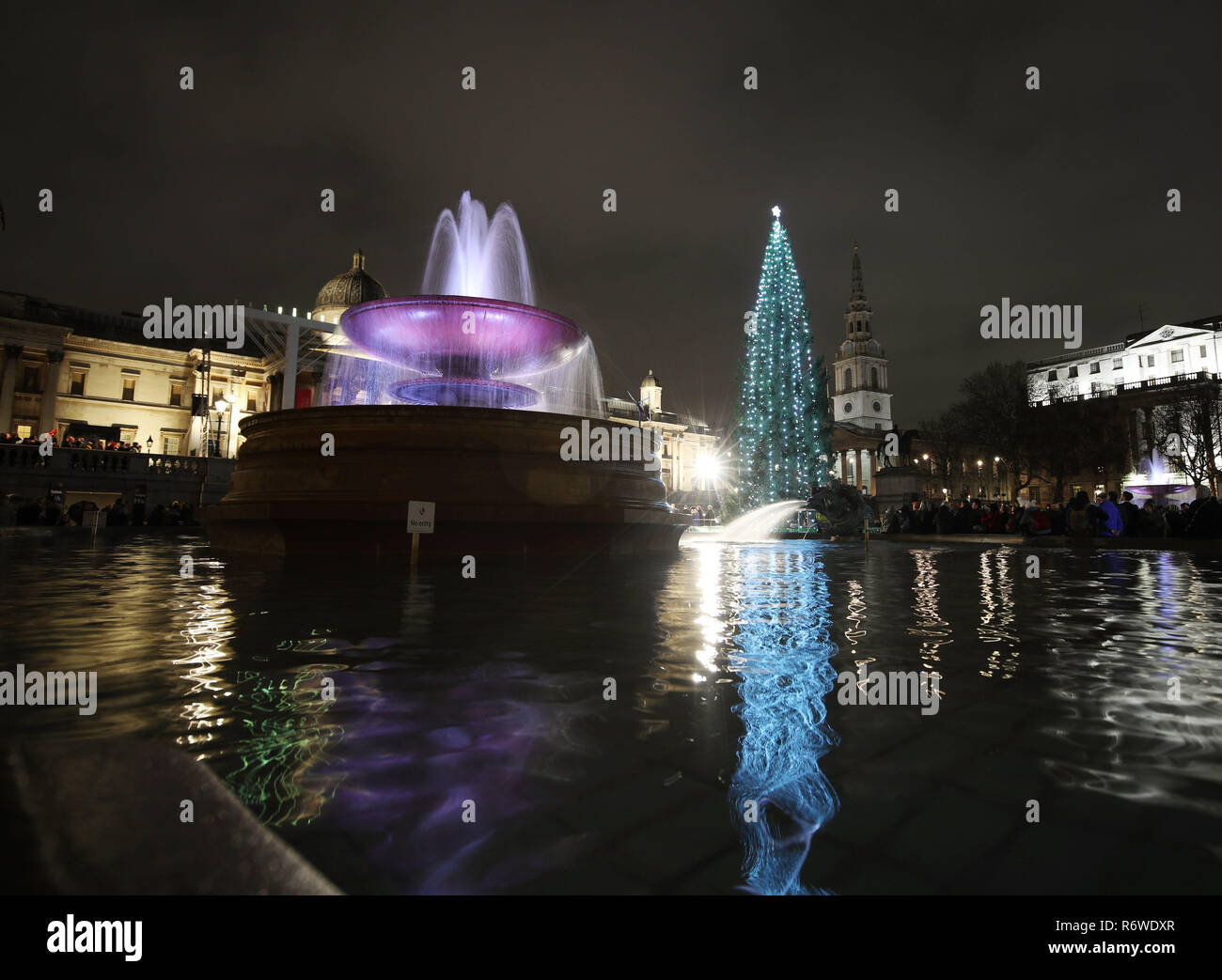 The Trafalgar Square Christmas Tree Is Lit Up In Central London Stock ...