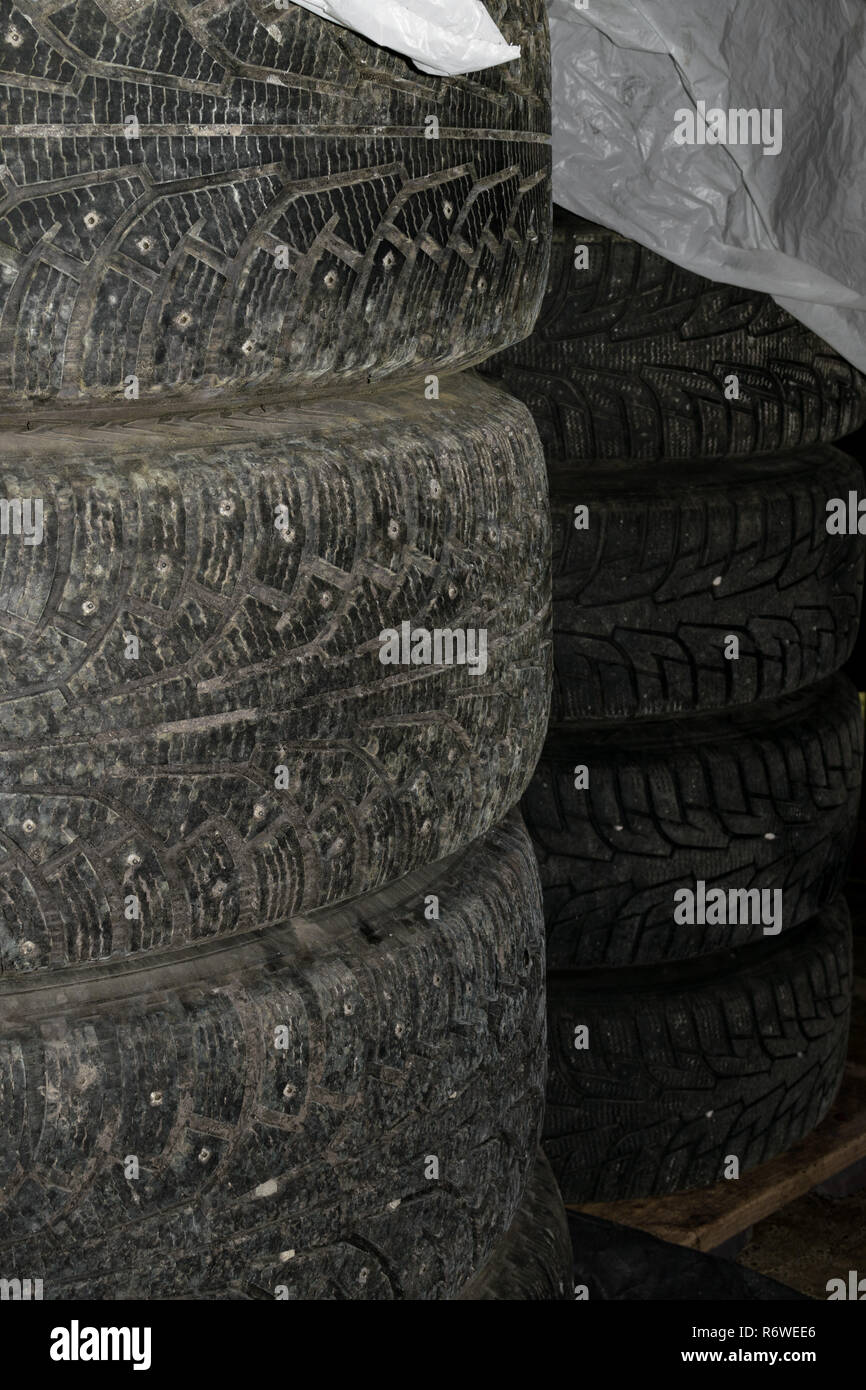 winter tires set with spikes covered plastic wrap Stock Photo Alamy
