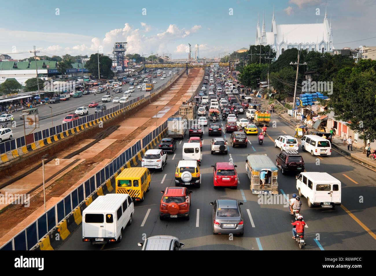 Building site for the new highway on Commonwealth Avenue, connecting Quezon City and Manila, The Philippines, Asia Stock Photo