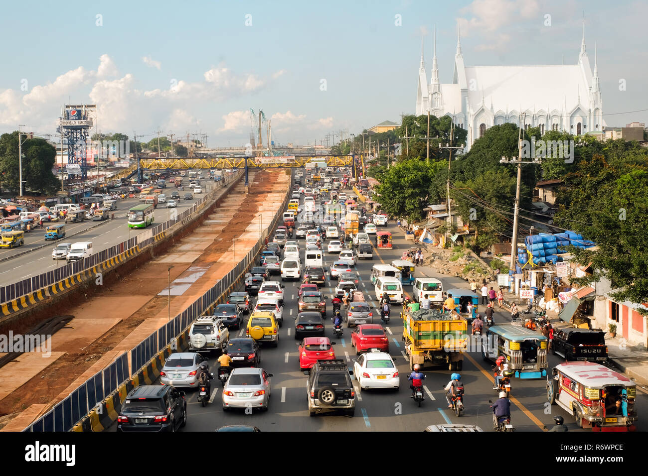 Building site for the new highway on Commonwealth Avenue, connecting Quezon City and Manila, The Philippines, Asia Stock Photo