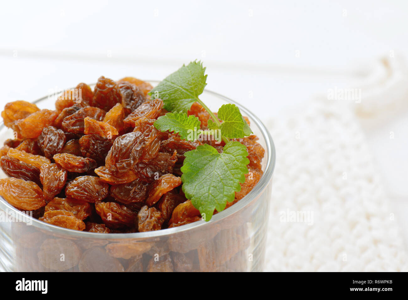 glass of sweet raisins Stock Photo - Alamy
