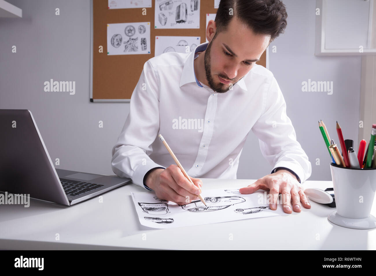 Artist Sketching On White Paper Stock Photo Alamy