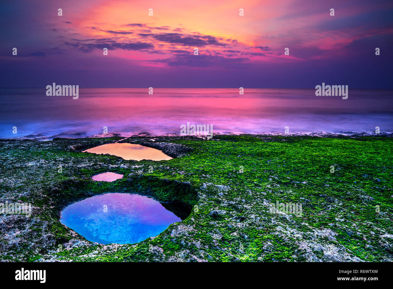 Sunset on the beach in Bali Stock Photo - Alamy