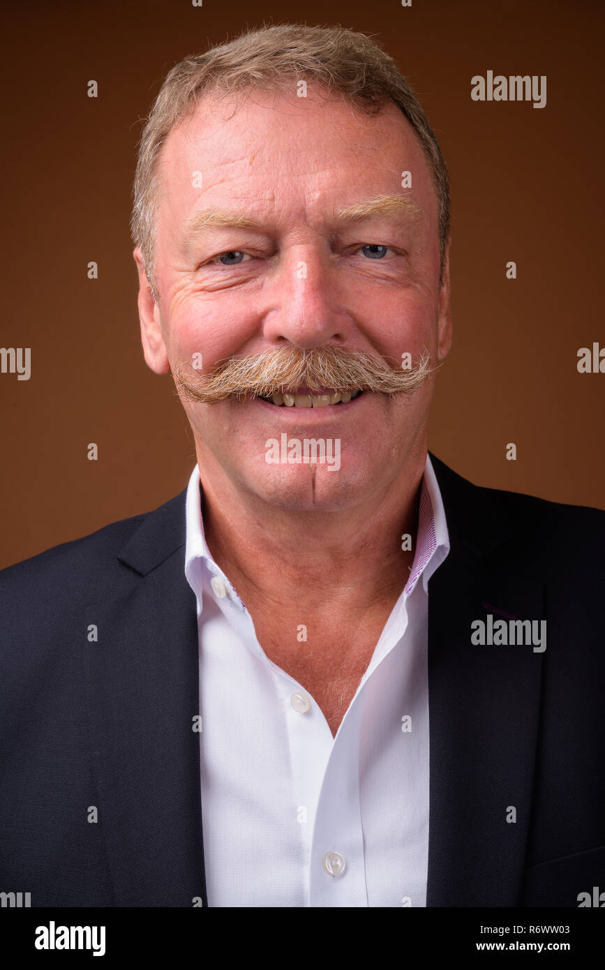 Happy senior man looking camera hi-res stock photography and images - Alamy