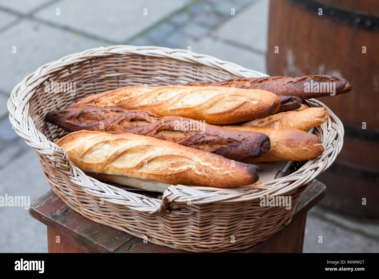French baguettes in a wicker basket. Outdoor Stock Photo - Alamy