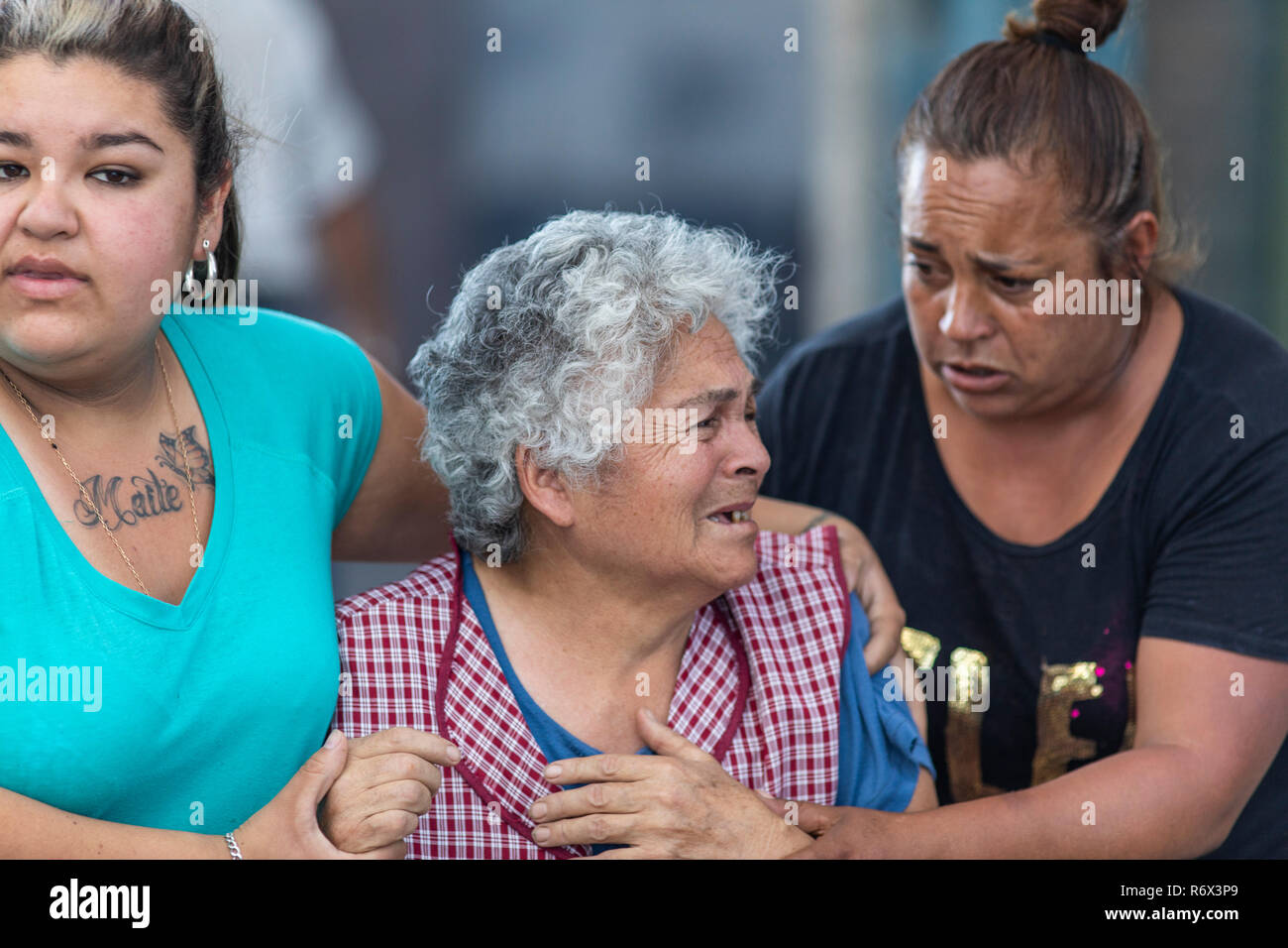 People victims of fire inside a workshop in Pudahuel neighborhood at Santiago de Chile City in between smoke a great misfortune Stock Photo