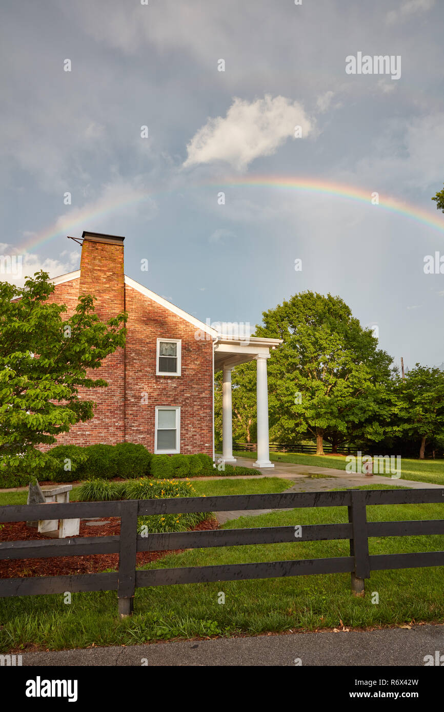 Rainbow over the historic Carter House at Lakeview Park in Frankfort
