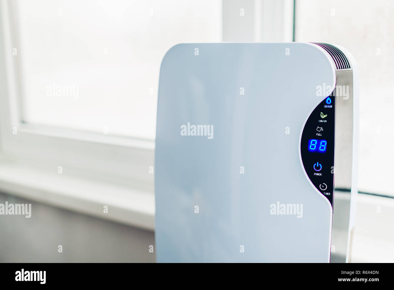 Dehumidifier with touch panel, humidity indicator, uv lamp, air ionizer ...