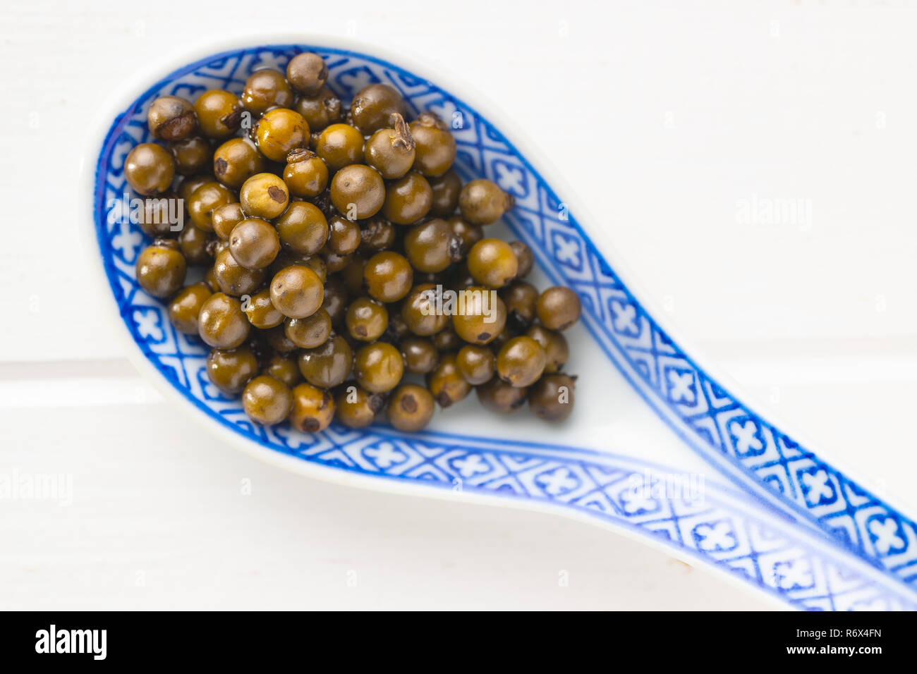 Green peppercorn in brine Stock Photo Alamy