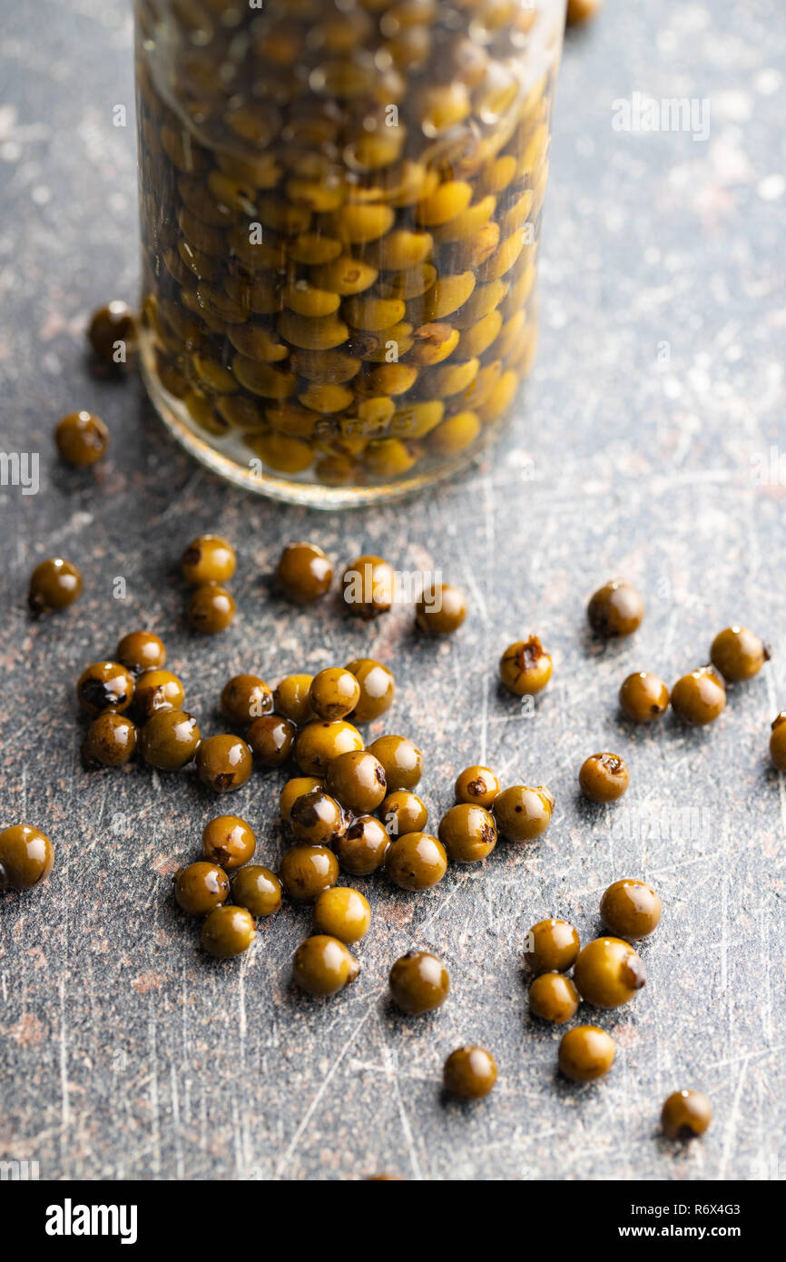 Green peppercorn in brine Stock Photo Alamy