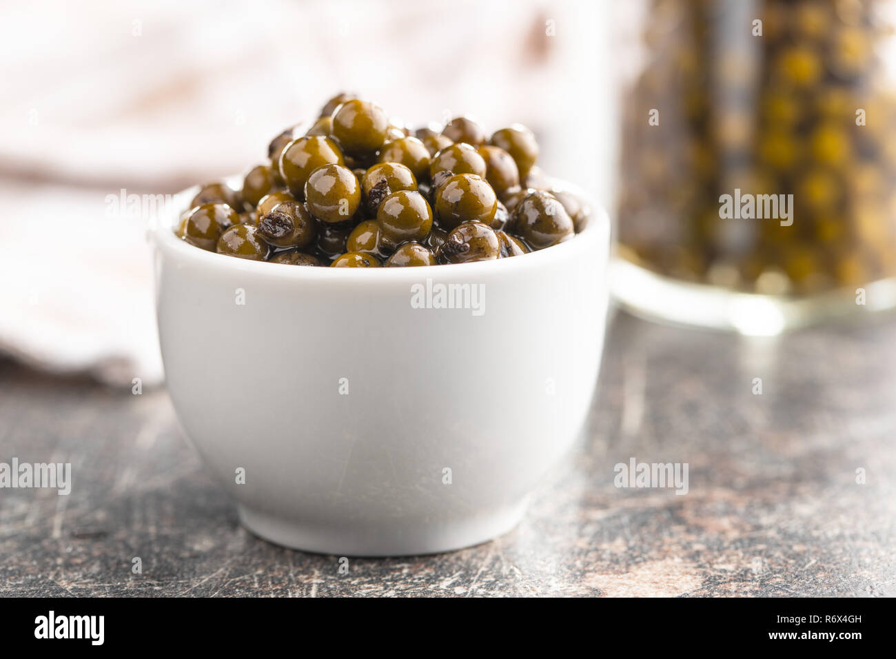 Green peppercorn in brine Stock Photo Alamy